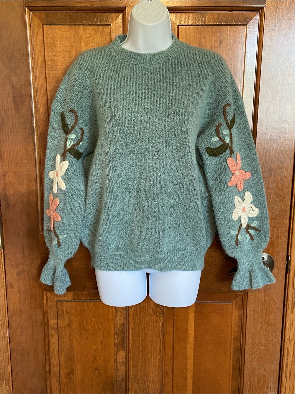 See and be seen sweater cozy, vintage-inspired charm delicate feminine accents S